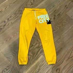 FreeCity sweatpants. Color: yellow. Size: 1/S. Unisex. Great condition!
